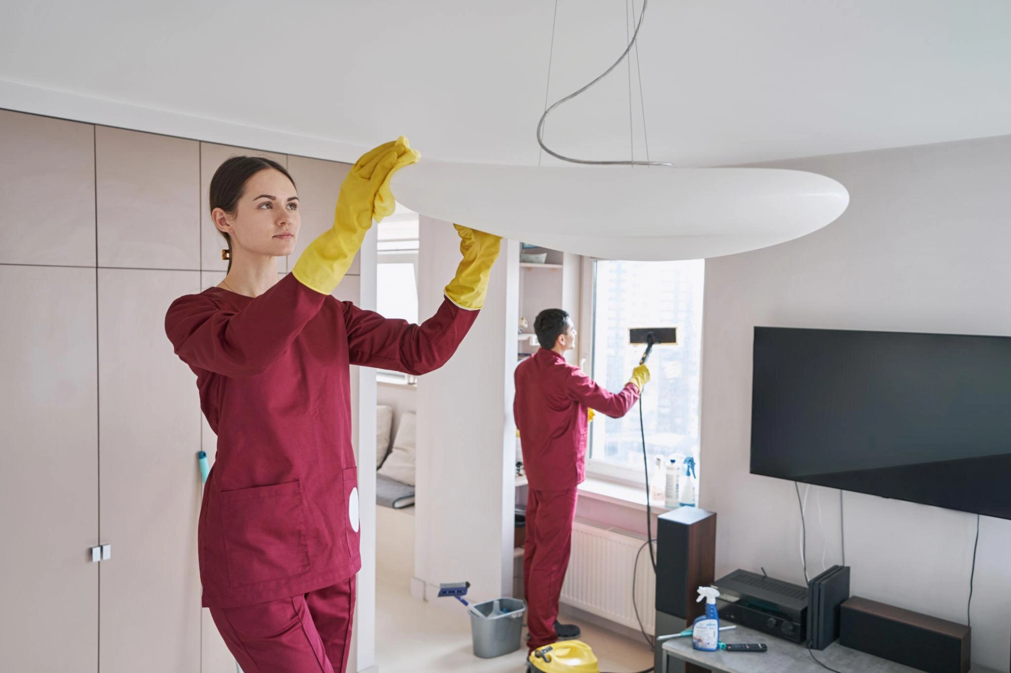 cleaners doing detailed house cleaning